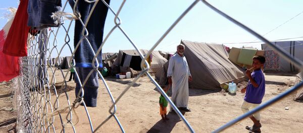 Iraquianos desalojados após a ofensiva do Estado Islâmico - Sputnik Brasil