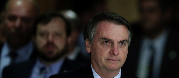 Jair Bolsonaro chegando ao encontro no Palácio do Planalto em Brasília (foto de arquivo) Jair Bolsonaro chegando ao encontro no Palácio do Planalto em Brasília (foto de arquivo) - Sputnik Brasil