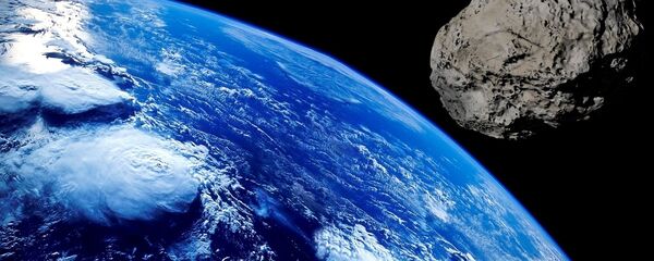 Asteroide se aproximando da Terra (imagem ilustrativa) - Sputnik Brasil