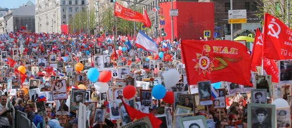 Participantes da ação popular Regimento Imortal em Moscou, 9 de maio de 2018 - Sputnik Brasil