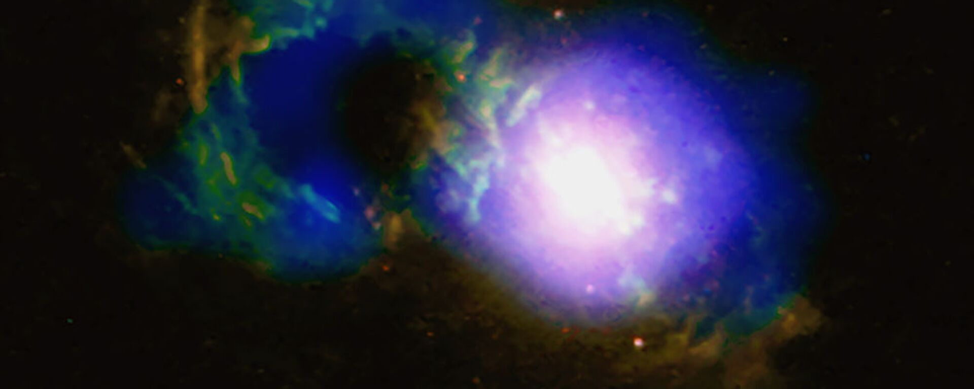 Quasar Teacup – denominado assim por ter uma forma incomum – junto com o buraco negro supermassivo SDSS 1430 + 1339 - Sputnik Brasil, 1920, 15.01.2021