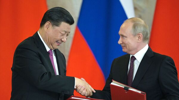 Presidente da Rússia, Vladimir Putin, participa de eventos realizados no âmbito de visita à Rússia do presidente da China, Xi Jinping - Sputnik Brasil