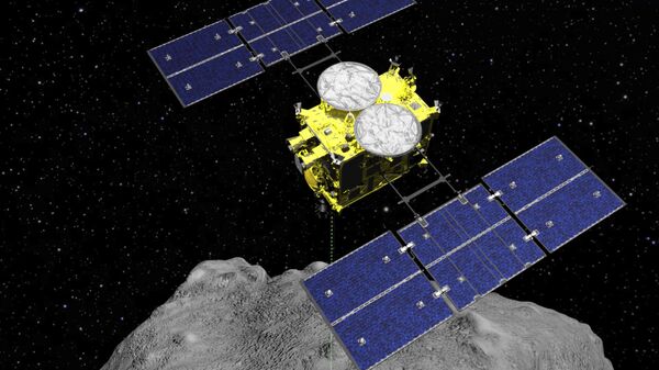 Imagem computadorizada da nave espacial Hayabusa 2 perto do asteroide Ryugu, em 5 de abril de 2019 (foto de arquivo) - Sputnik Brasil