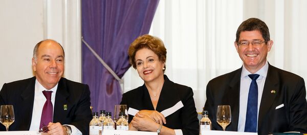 A presidenta do Brasil, Dilma Rousseff, acompanhada do chanceler Mauro Vieira e do ministro da Fazenda, Joaquim Levy, durante encontro com empresários em Nova York - Sputnik Brasil