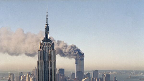 Torres Gêmeas do World Trade Center (WTC) ardem depois do ataque terrorista, 11 de setembro de 2011 (foto de arquivo) - Sputnik Brasil