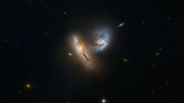 Fusão de duas galáxias designada UGC 2369. Imagem foi feita pelo telescópio Hubble e publicada em 05/08/2019 - Sputnik Brasil