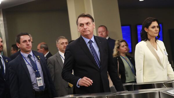 O presidente do Brasil, Jair Bolsonaro, chega à 74ª Assembleia Geral da Organização das Nações Unidas (ONU), ao lado de sua esposa, Michelle Bolsonaro, no dia 24 de setembro de 2019. - Sputnik Brasil