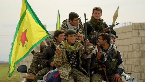 Membros da milícia curda Unidades de Proteção Popular (YPG) - Sputnik Brasil