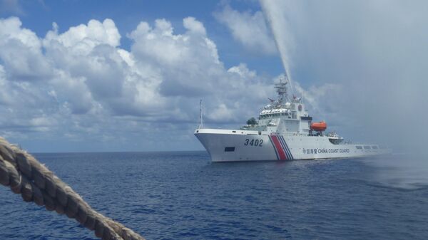 Arquivo: membros da Guarda Costeira chinesa no mar do Sul da China - Sputnik Brasil