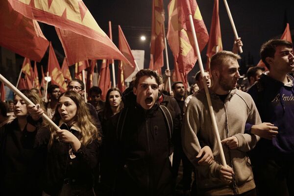 Participantes de ação de protesto em Atenas, Grécia - Sputnik Brasil