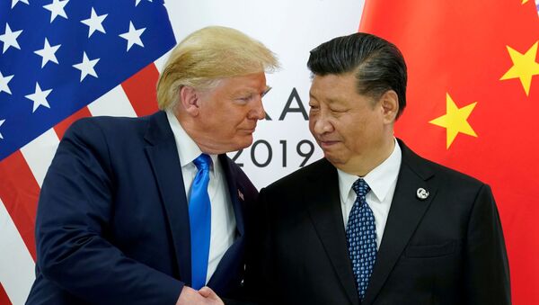 Presidente dos EUA, Donald Trump e presidente da China, Xi Jinping, no encontro bilateral na cúpula do G20 em Osaka, Japão, 29 de junho de 2019 (foto de arquivo) - Sputnik Brasil