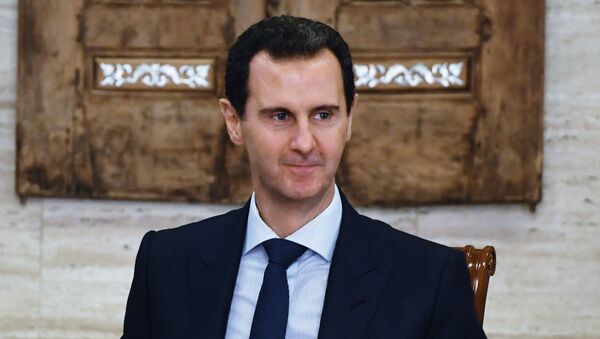Presidente da Síria, Bashar Assad, durante reunião com comissão russa em Damasco (foto de arquivo). - Sputnik Brasil