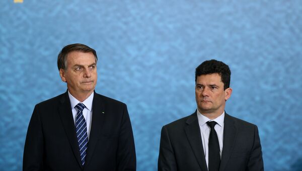  O presidente Jair Bolsonaro com o ministro da Justiça, Sergio Moro, em cerimônia em Brasília - Sputnik Brasil
