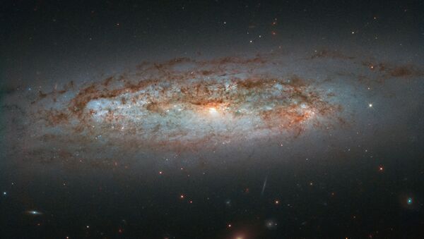 NGC 3175 localizado a aproximadamente 50 milhões de anos-luz da Terra - Sputnik Brasil