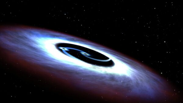 Telescópio Espacial Hubble da NASA encontra dois buracos negros supermassivos na galáxia Markarian 231 (imagem de arquivo) - Sputnik Brasil