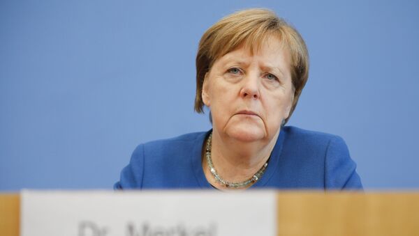 A chanceler alemã, Angela Merkel, durante uma coletiva de imprensa para falar sobre o novo coronavírus. - Sputnik Brasil