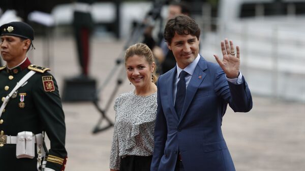 Justin Trudeau e sua esposa Sophie Gregoire Trudeau durante viagem ao México. - Sputnik Brasil