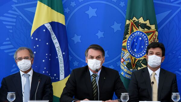 Presidente Jair Bolsonaro e ministros do governo dão entrevista coletiva sobre coronavírus - Sputnik Brasil