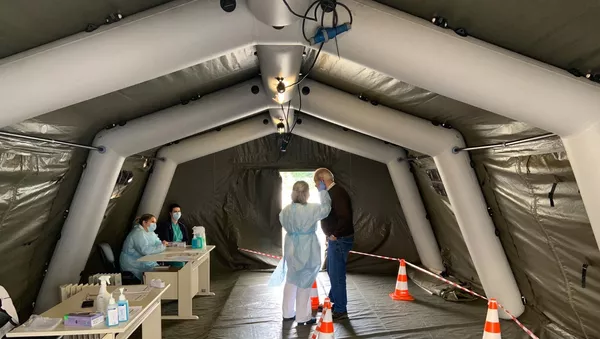 Hospital militar montado na cidade do Porto, em Portugal, para combate à pandemia - Sputnik Brasil