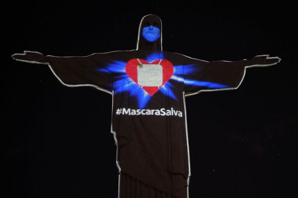 Cristo Redentor veste máscara para conscientizar população contra a COVID-19 (VÍDEO) - Sputnik Brasil