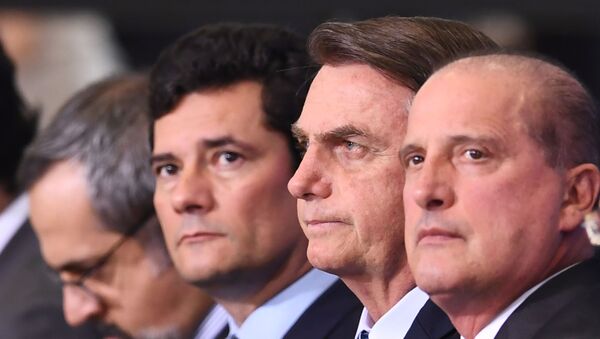 O presidente Jair Bolsonaro, o ex-ministro da Justiça e Segurança Pública, Sérgio Moro e o ministro da Cidadania, Onyx Lorenzoni, 22 de agosto de 2019 (foto de arquivo) - Sputnik Brasil