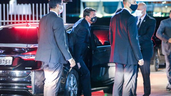 O presidente Jair Bolsonaro entrando no Palácio da Alvorada, em Brasília (DF), 13 de maio de 2020.  - Sputnik Brasil