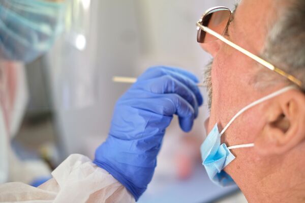 Dificuldades em se mover ou falar: OMS adverte sobre novos sintomas da COVID-19 - Sputnik Brasil