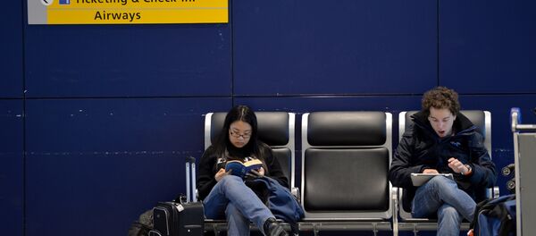 Sala de espera no aeroporto JFK, em Nova York - Sputnik Brasil