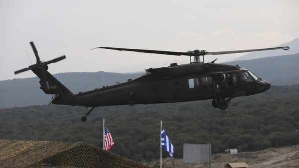 Helicóptero participando de exercício militar no norte da Grécia, 19 de fevereiro de 2020. Forças Aéreas da Grécia e dos EUA participaram de um exercício de fogo real, marcando o aprofundamento dos laços de defesa entre os dois países - Sputnik Brasil