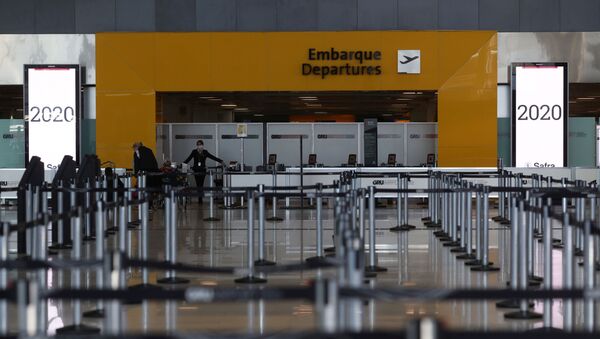 Salão de check-in vazio no Aeroporto Internacional de Guarulhos devido à pandemia da COVID-19, em Guarulhos, perto de São Paulo, Brasil, 25 de maio de 2020. - Sputnik Brasil