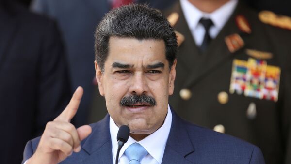 O presidente da Venezuela, Nicolás Maduro, fala durante uma coletiva de imprensa - Sputnik Brasil