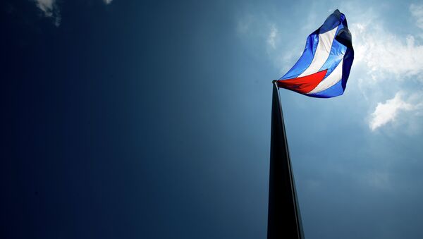 Bandeira cubana tremula sobre sua nova embaixada em Washington. - Sputnik Brasil