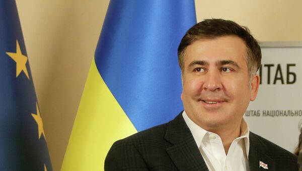 Former Georgian president Mikhail Saakashvili smiles as he arrived at the opposition headquarters in Kiev, Ukraine, Saturday, Dec. 7, 2013 - Sputnik Brasil