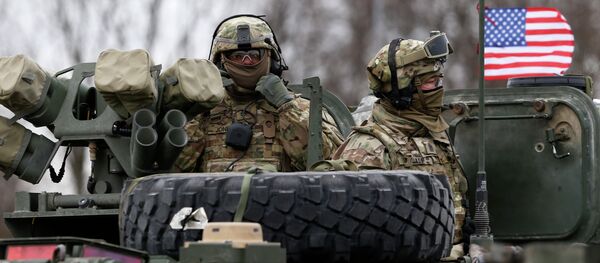 Soldados norte-americanos em veículo armado durante o exercício militar ''Dragoon Ride''na Lituânia - Sputnik Brasil