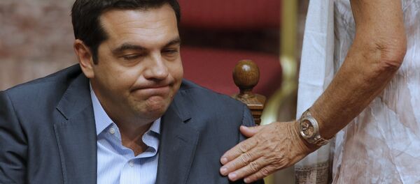 Greek Prime Minister Alexis Tsipras reacts as he attends a parliamentary session in Athens, Greece, August 14, 2015 Greek Prime Minister Alexis Tsipras reacts as he attends a parliamentary session in Athens, Greece, August 14, 2015 - Sputnik Brasil