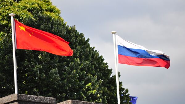 Bandeiras da Rússia e da China - Sputnik Brasil