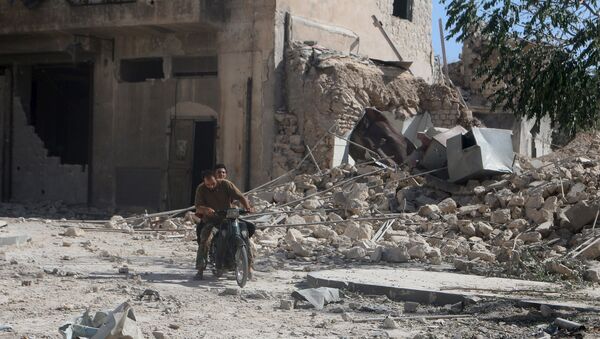 Área destruída na cidade de Alepo, na Síria. - Sputnik Brasil
