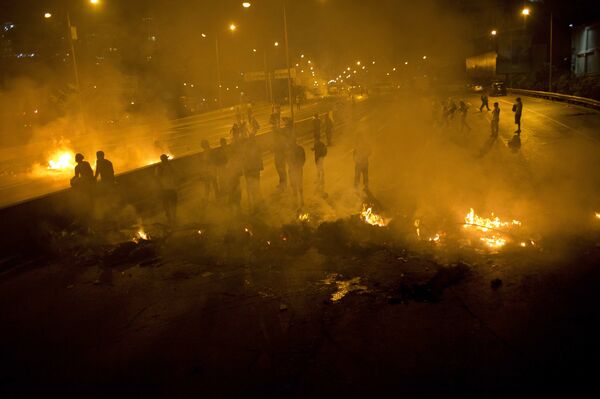 Os protestos de 12 de fevereiro de 2014 (na foto) terminaram na morte de 43 pessoas - Sputnik Brasil