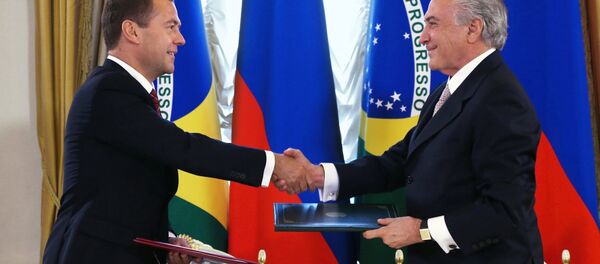 Premiê da Rússia Dmitry Medvedev com vice-presidente do Brasil Michel Temer em Moscou, em 16 de setembro Premiê da Rússia Dmitry Medvedev com vice-presidente do Brasil Michel Temer em Moscou, em 16 de setembro - Sputnik Brasil
