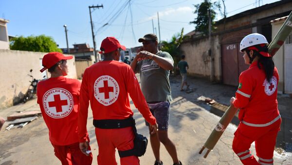 Colaboradores da Cruz Vermelha - Sputnik Brasil