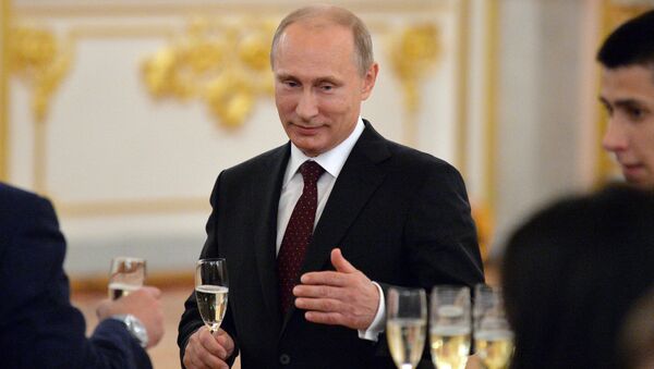 Presidente russo Vladimir Putin assiste à cerimónia de homenagem da equipa de hóquei russa, 27 de maio de 2014 - Sputnik Brasil