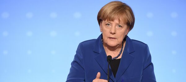 Angela Merkel, chanceler da Alemanha, em entrevista coletiva no palácio Eliseu, em Paris, em 2 de outubro de 2015 - Sputnik Brasil