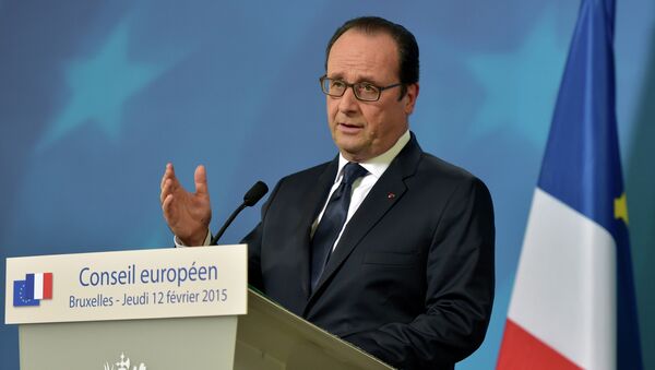 France's President Francois Hollande addresses a news conference after an European Union leaders summit in Brussels February 12, 2015. - Sputnik Brasil