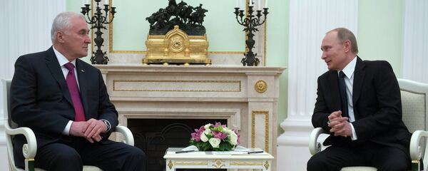 Presidente da Ossétia do Sul Leonid Tibilov e o presidente da Rússia Vladimir Putin durante a reunião em Kremlin, Moscou Presidente da Ossétia do Sul Leonid Tibilov e o presidente da Rússia Vladimir Putin durante a reunião em Kremlin, Moscou - Sputnik Brasil