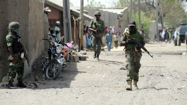 Soldados nigerianos em uma remota cidade no estado de Borno, nordeste do país. - Sputnik Brasil