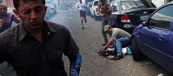 Adolescente morre durante protestos na Venezuela - Sputnik Brasil