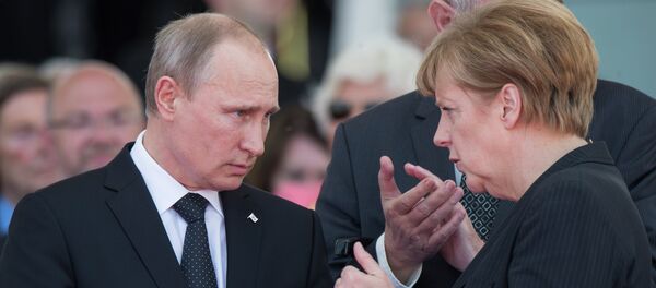 Vladimir Putin, Presidente da Rússia, e Angela Merkel, Chanceler da Alemanha - Sputnik Brasil