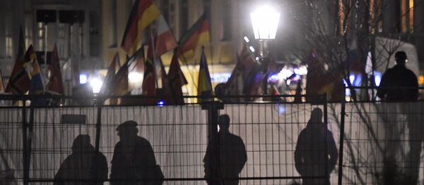 Manifestação anti-islâmica do grupo Pegida na Alemanha Manifestação anti-islâmica do grupo Pegida na Alemanha - Sputnik Brasil