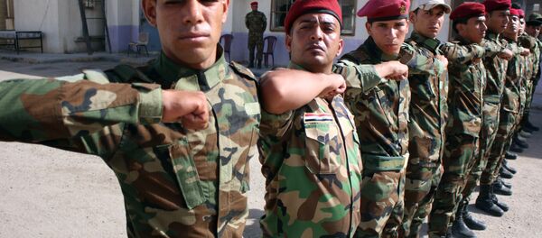 Voluntários iraquianos xiitas no campo militar na cidade de Basra, Iraque - Sputnik Brasil