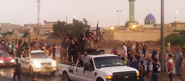 Combatentes do grupo terrorista Estado Islâmico no Iraque, cidade de Mosul. 25 de junho de 2014 - Sputnik Brasil